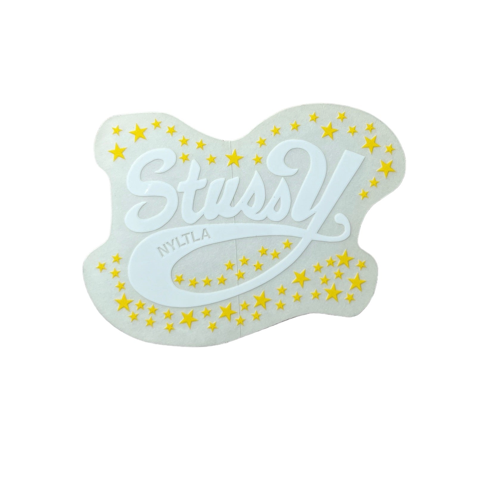 Stussy NYLTLA Stars Vintage Sticker in yellow. The sticker measures 3.75"x2.75".