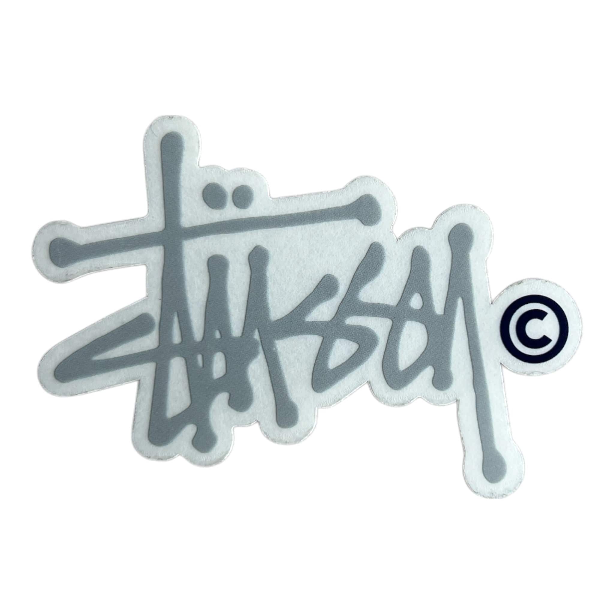 Stussy logo sticker with a copyright symbol on a white background