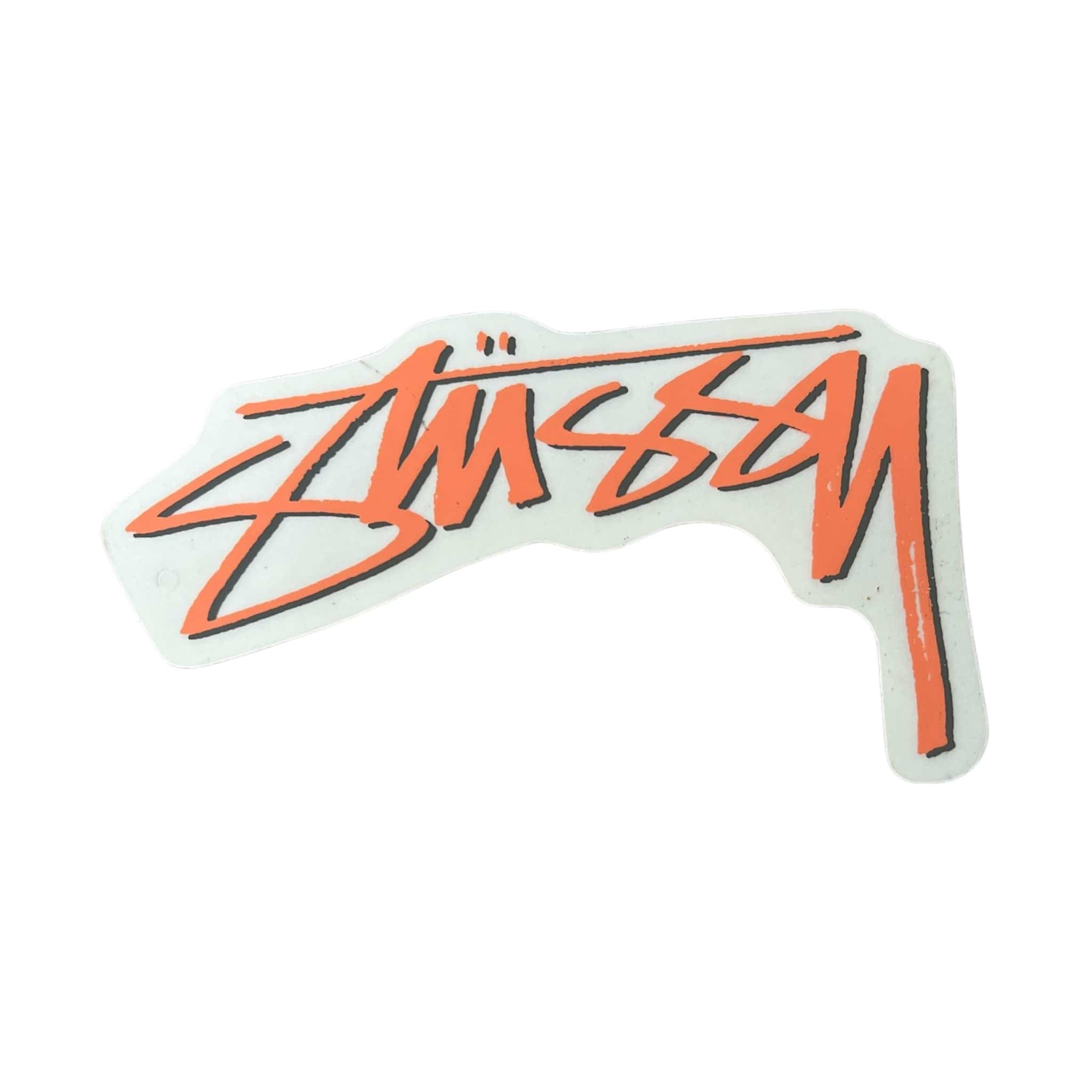 Sticker with 'Stussy' logo in orange on a white background