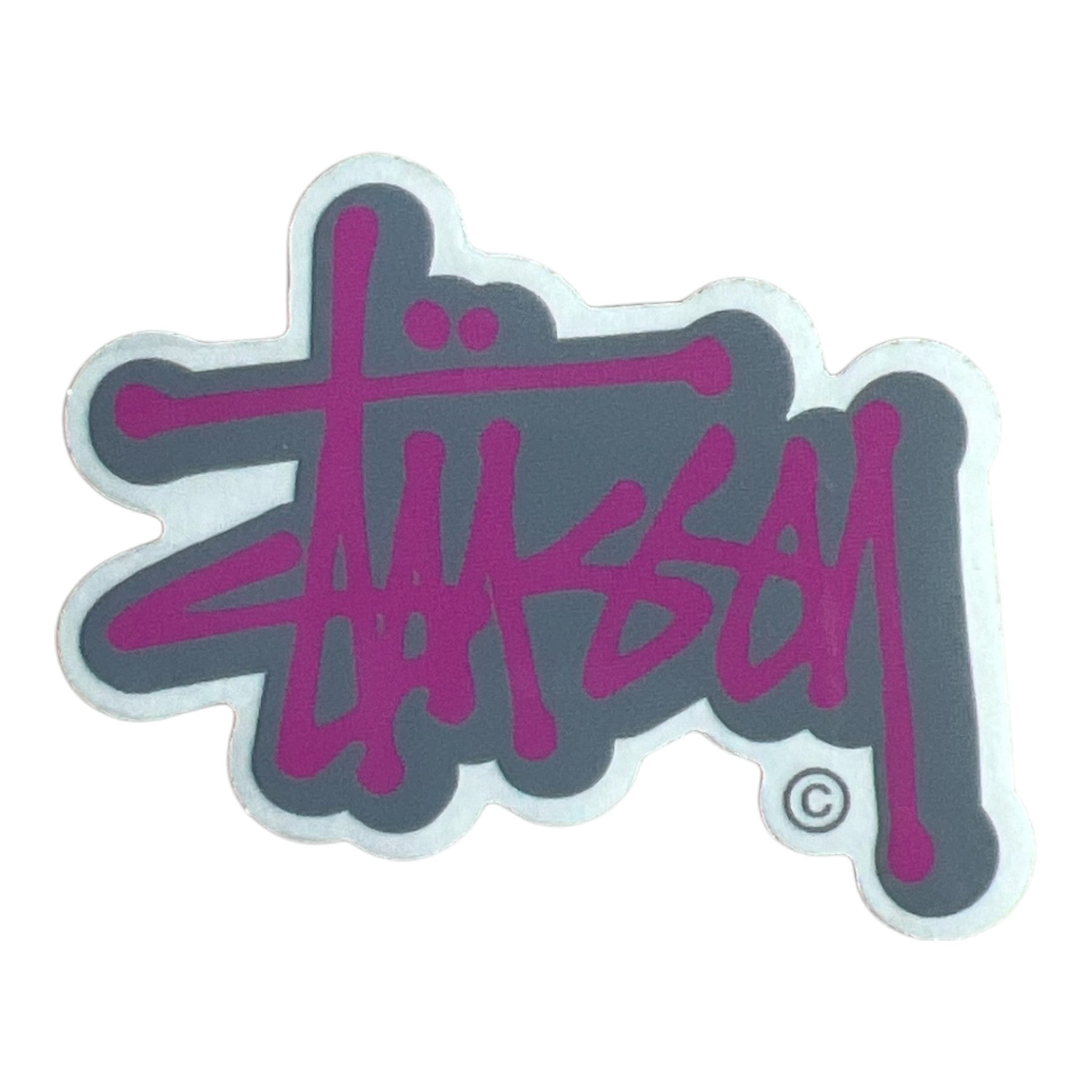 Stussy logo sticker with purple text on a gray background