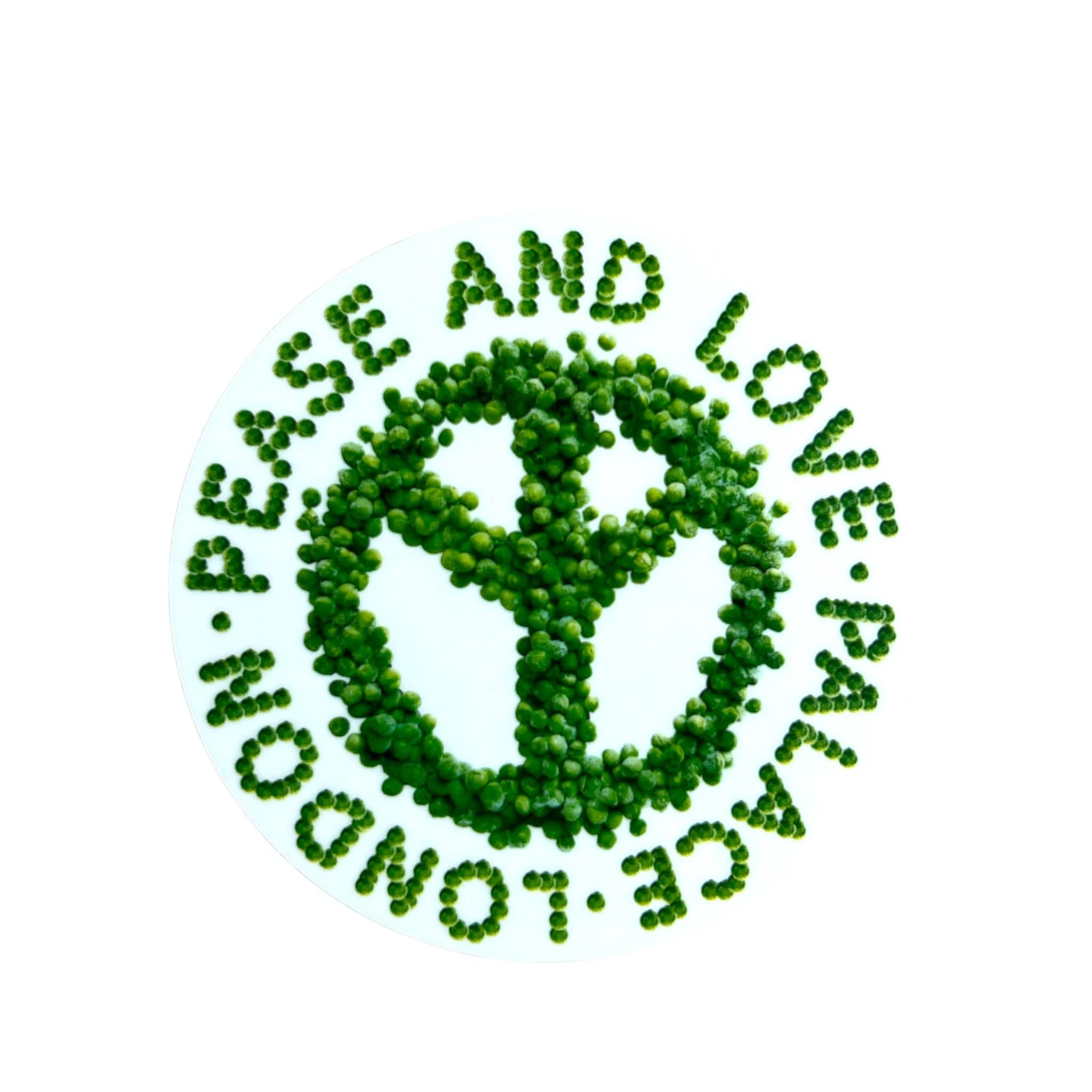 Green peace symbol made of peas with 'Pease and Love Palace London' text on a white background