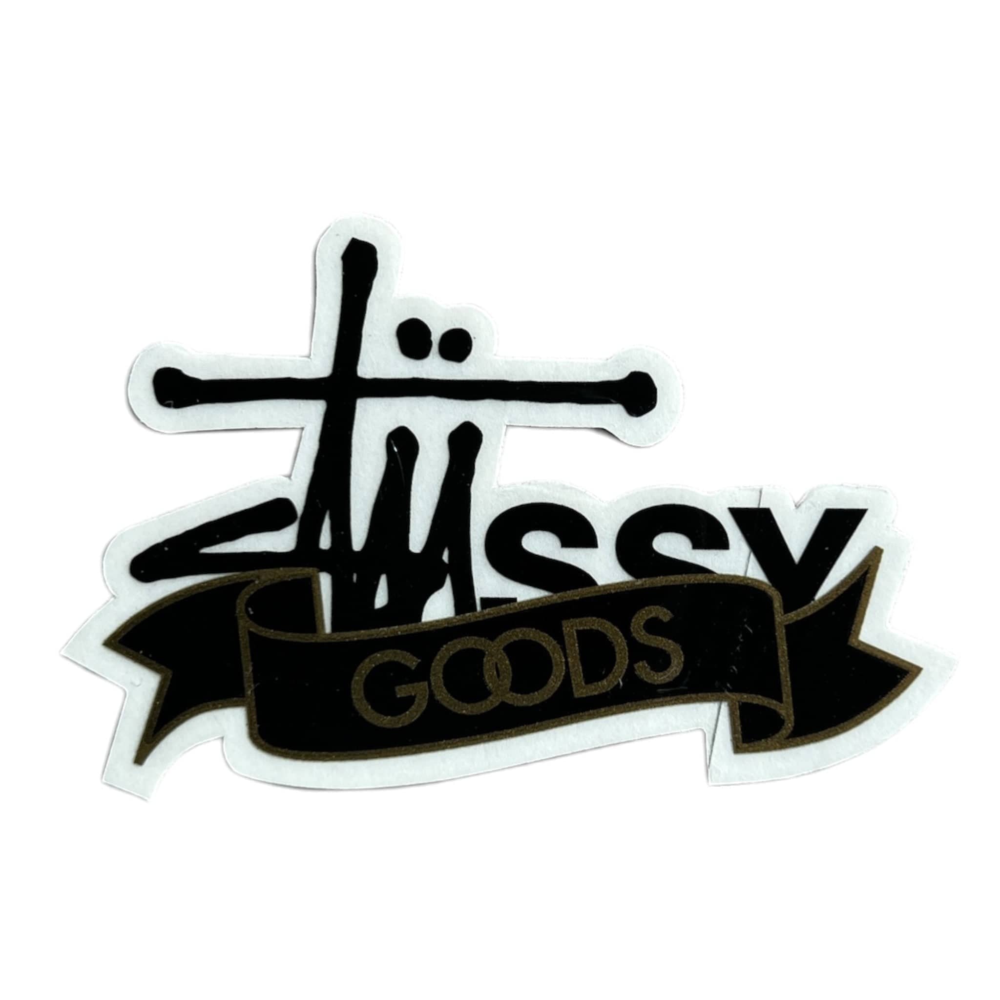 Sticker with 'Stussy Goods' text and design on a white background