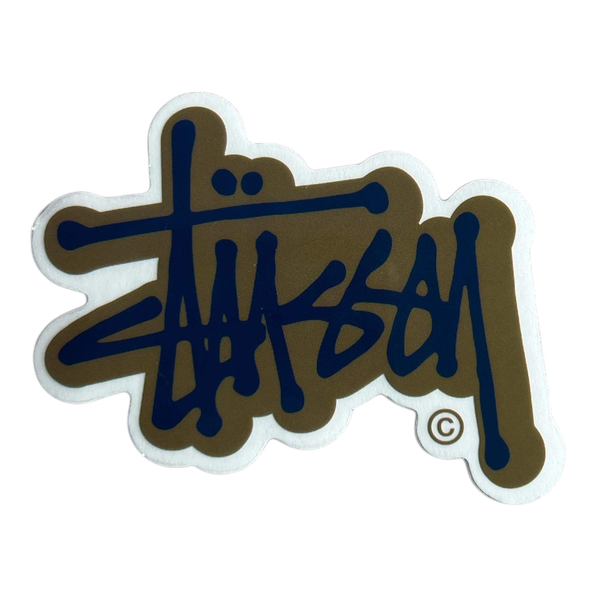 Stussy logo sticker with brown and blue design on a white background
