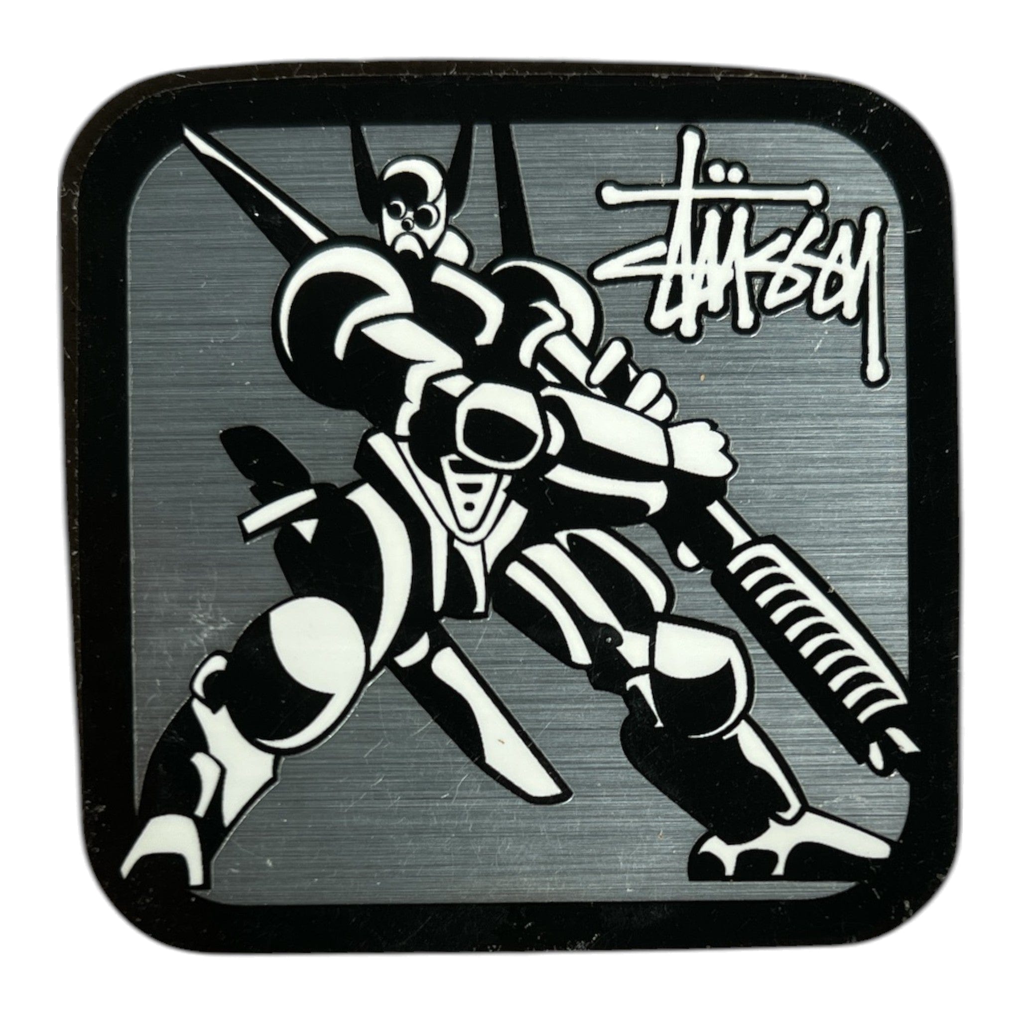 Black and white skeleton warrior design with 'Stussy' logo on a square patch.