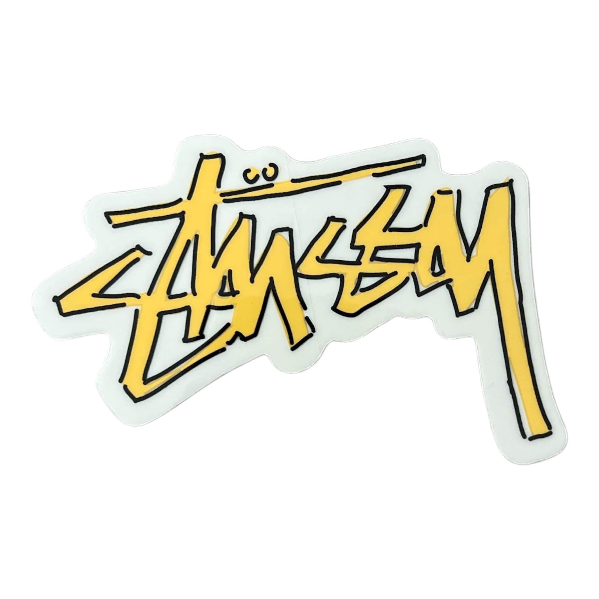 Yellow 'Stussy' logo on a white background